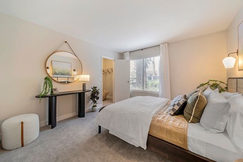 a bedroom with a bed and a window  at Citrine Hills, Ontario, CA